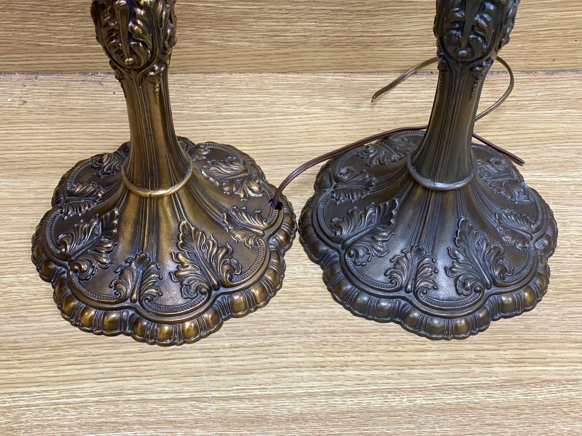 A pair of brass Art Nouveau style lamps